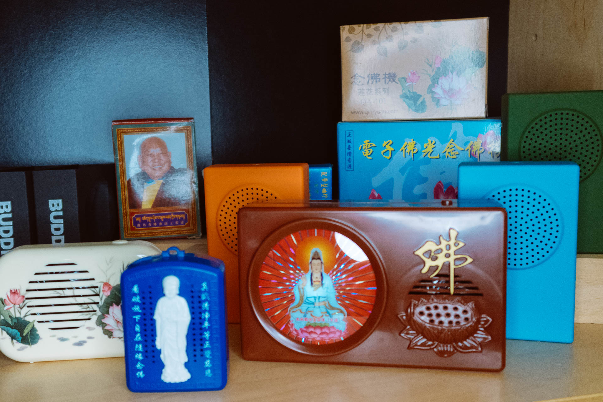 Collection of Buddha Machines and electronic prayer and chant boxes